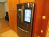 Refrigerator with computer screen.  