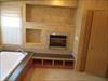 Fireplace.  Yes a fireplace in the bathroom. 