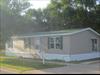 Exterior.  They moved the window from the LR end wall to the side wall.  They had plans for the end wall that they did not want a window. 