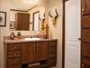 Master bathroom.  Furniture style lav.  Factory picture