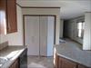 Washer dryer area.  The rear door was omitted.  Patio door instead.