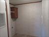 Laundry room.  There is normally a rear door there.  They chose to omit it.  Made for an area for a freezer or storage.