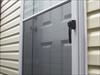 Steel door.  This is a scissor door.  Notice where the inside and outside handles are located.