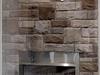 Corner Fireplace with full Stone Surround
