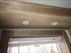 Puck lights over the sink.  Below decorator shelf.