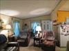 The front door is hidden.  It is behind the lamp.  Kind of a little foyer there. 