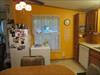 The dining area is designed to be where the 2 freezers are. 