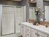 60&quot; Shower and Furniture style Vanity.  Transom lights above vanity.